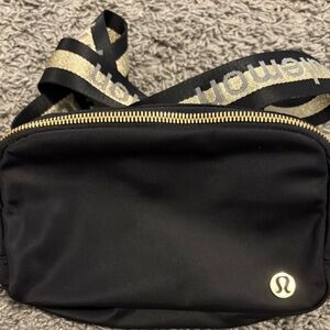 lululemon athletica Black Crossbody Bag with Gold Accents